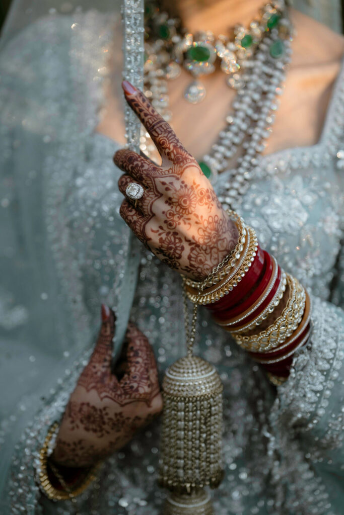 Anand Karaj of Tavneet and Balkarn at Calamigos Ranch in California | Wedding Planning and Design by The Marigold Company As family and friends gathered, Tavneet and Balky completed the Four Lavaan, walking together around the Guru Granth Sahib as sacred hymns were sung. Each round represents a new stage of marriage, symbolizing commitment, spiritual growth, and building a life together with love and humility. Rather than allowing elaborate décor to overshadow the ceremony, we intentionally embraced a refined design that kept the focus on what mattered most—the significance of the Anand Karaj itself and the beginning of the couple's next chapter.