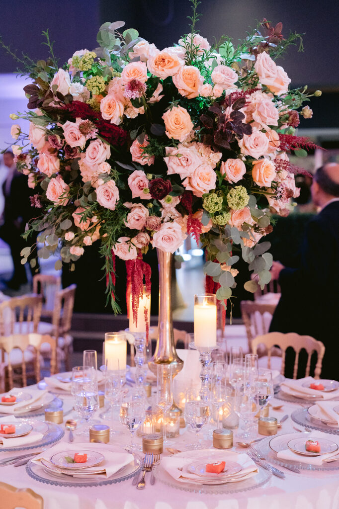 beautiful centerpiece decor with roses, roses wedding decor, candle decor for reception